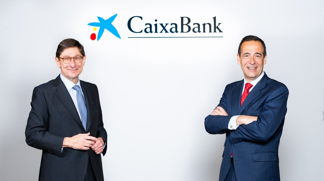 José Ignacio Goirigolzarri (izq.), presidente de Caixabank, y Gonzalo Gortázar, consejero delegado