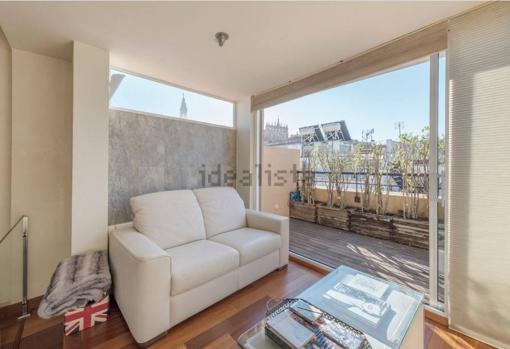 Salón y terraza con vistas de la Catedral