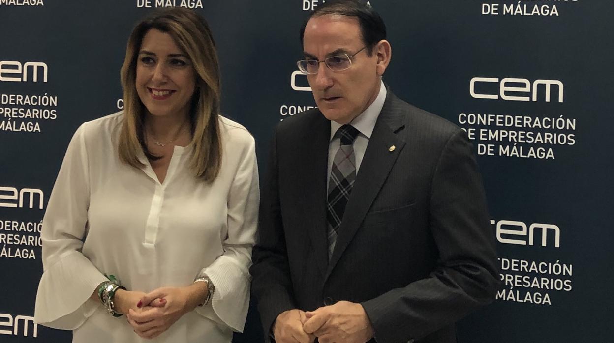 Susana Díaz y Javier González de Lara antes del encuentro con empresario en Málaga