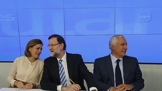 Rajoy, con Cospedal y Arenas, en la última junta directiva del PP