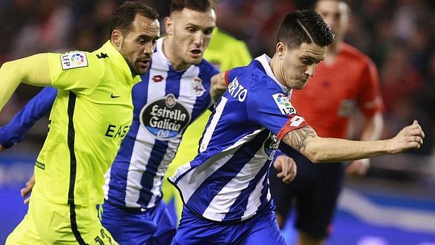 Juanfran y Luis Alberto durante el partido