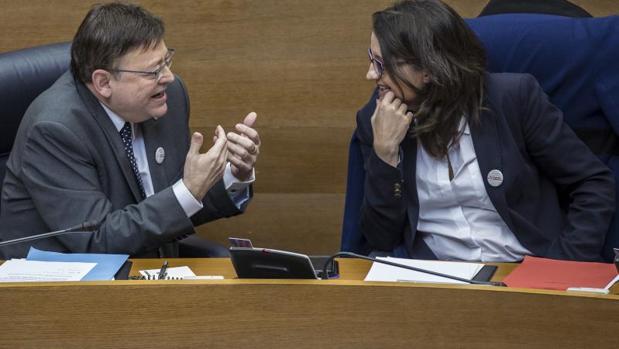 Puig y Oltra, en una sesión de control en las Cortes Valencianas