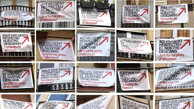 Imagen de pancartas colgadas en los balcones de los vecinos de Russafa