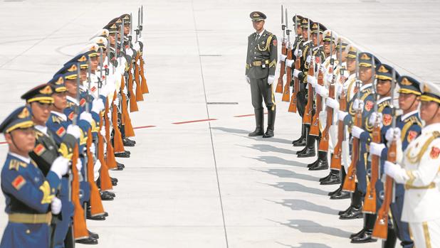 Rajoy, saludo junto al resto de líderes mundiales.