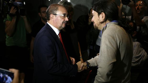 Javier Lambán (PSOE), que en Aragón gobierna gracias al apoyo de Podemos, coincidió este jueves en Zaragoza con Pablo Iglesias