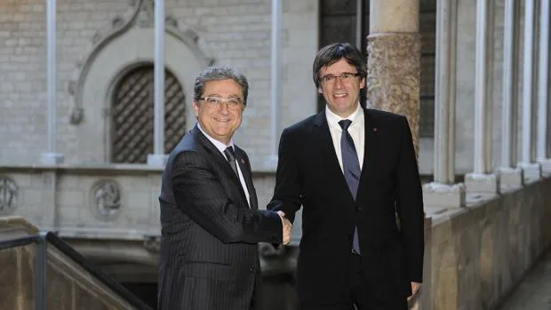 Millo, con Puigdemont, en una reunión el pasado diciembre