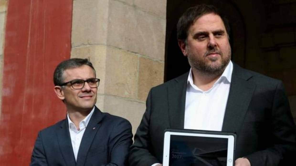 El vicepresidente de la Generalitat, Oriol Junqueras, con su número dos en Economía, Josep Maria Jové