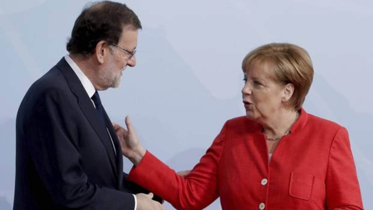 Mariano Rajoy y Angel Merkel, en una imagen de archivo