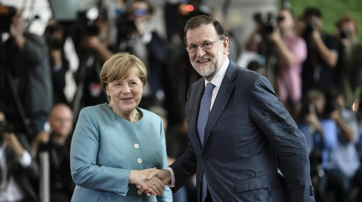 La canciller junto a Rajoy, en junio de 2017 en Berlin