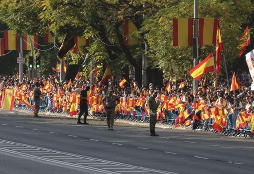 Desfile militar en el día de la Fiesta Nacional, presidido por don Felipe VI y doña Letizia