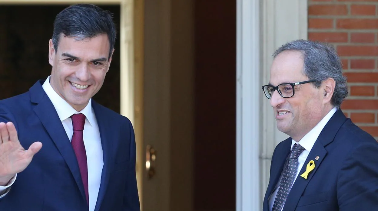 El presidente del Gobierno, Pedro Sánchez, y el presidente catalán, Quim Torra