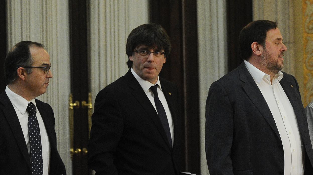 Turull, Junqueras y Puigdemont en el Parlament