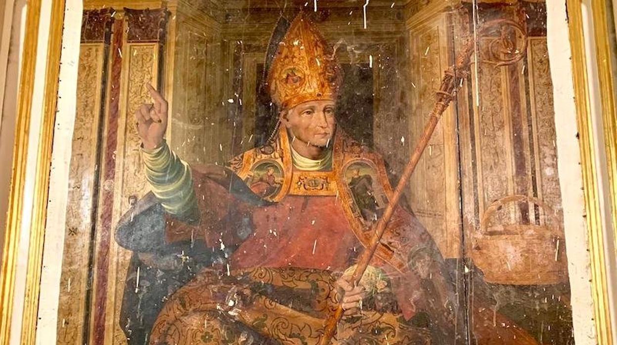 En la pintura se ve a San Julián vestido pontifical y en actitud sedente, mientras bendice con su mano derecha, en la que aparecen dos anillos, igual que en la izquierda, y sustenta, además, el báculo del que pende un sudario de tejido transparente.