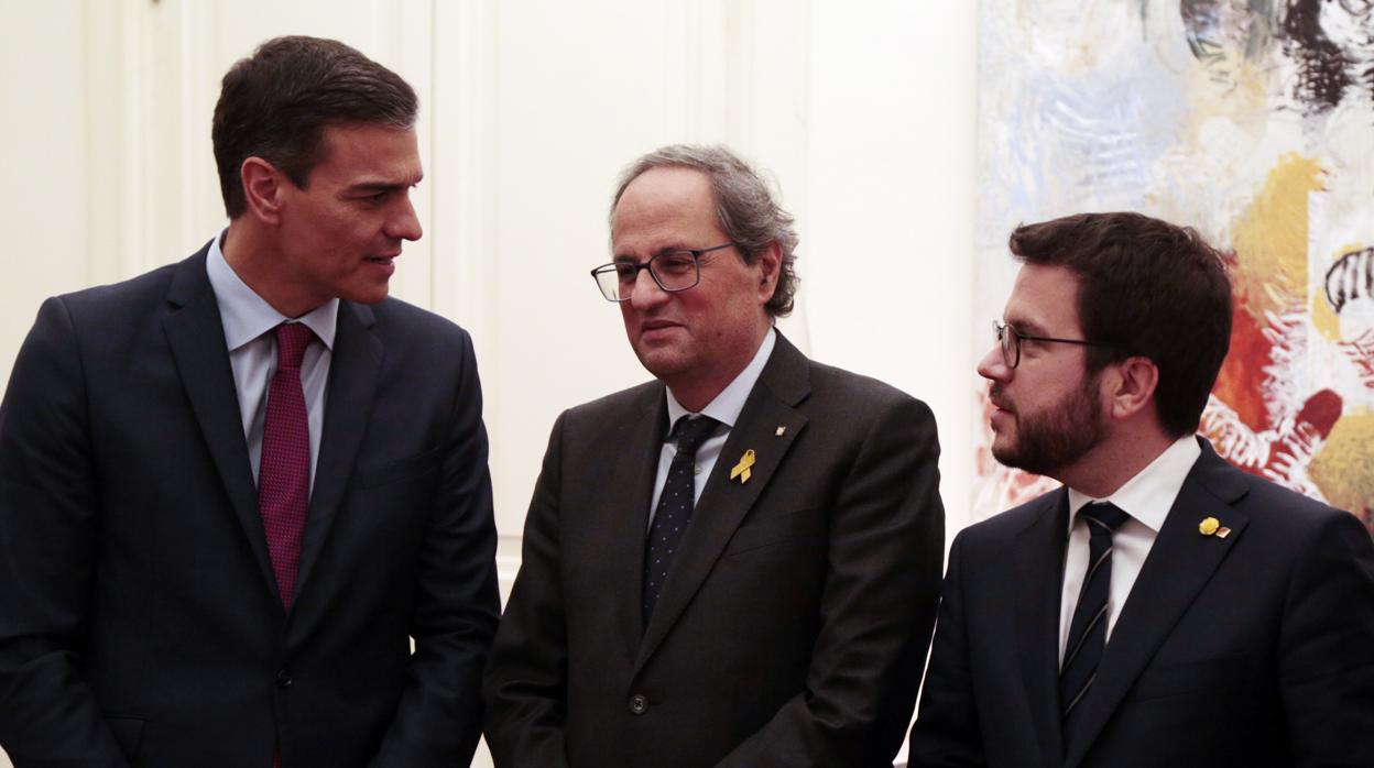 Sánchez, Torra y Aragonès en la reunión Estado-Generalitat del pasado mes de diciembre en Barcelona