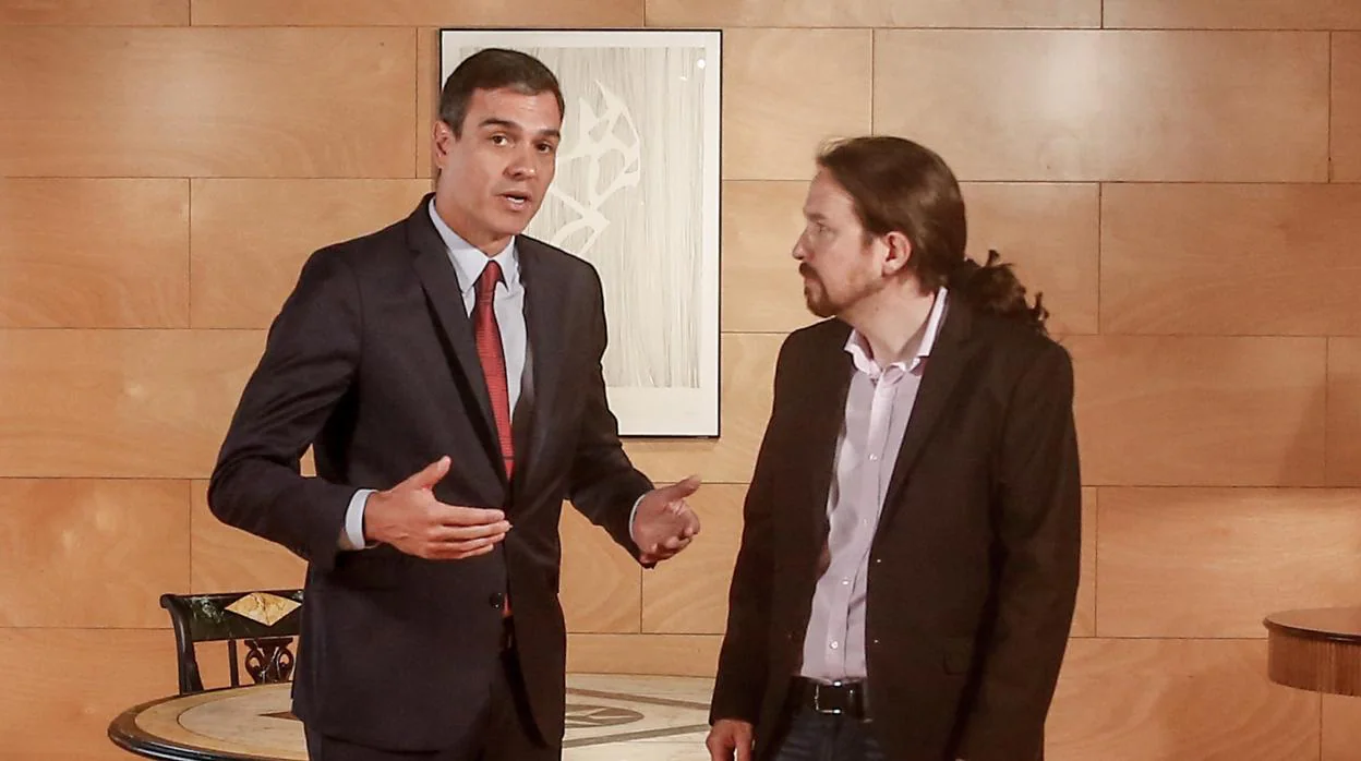 Pedro Sánchez, presidente del Gobierno en funciones y Pablo Iglesias, secretario general de Podemos