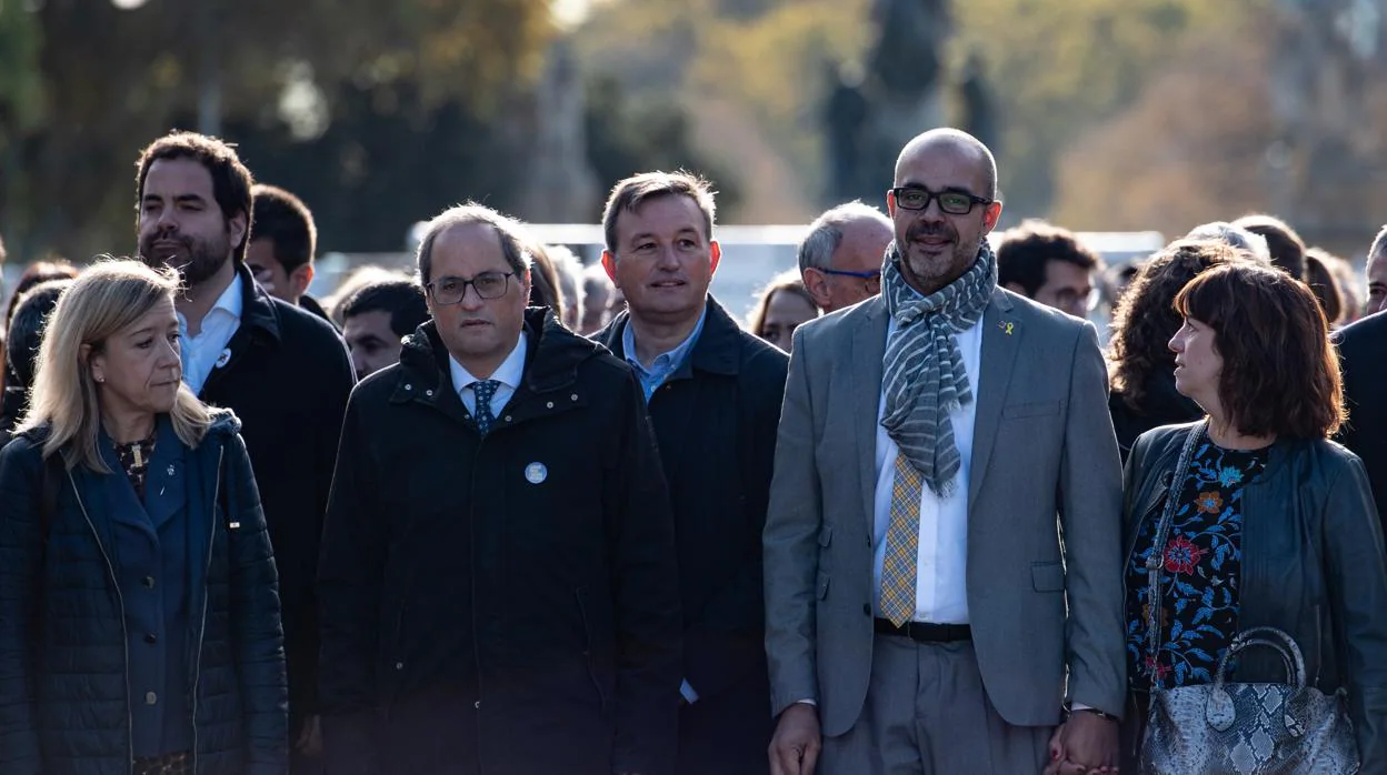 El presidente de la Generalitat, Quim Torra, y el consejero de Interior, Miquel Buch, en una foto de archivo