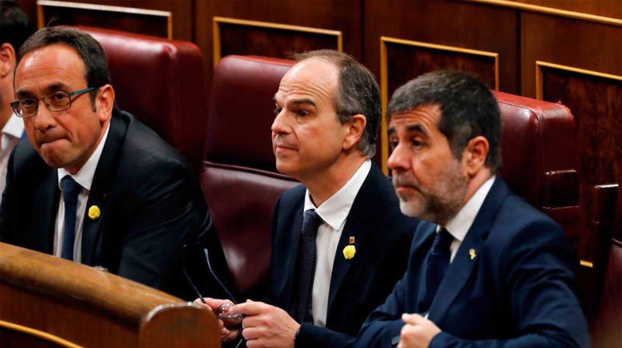 Los condenados del «procés» Josep Rull, Jordi Turull y Jordi Sànchez, en el Pleno de constitución del Congreso