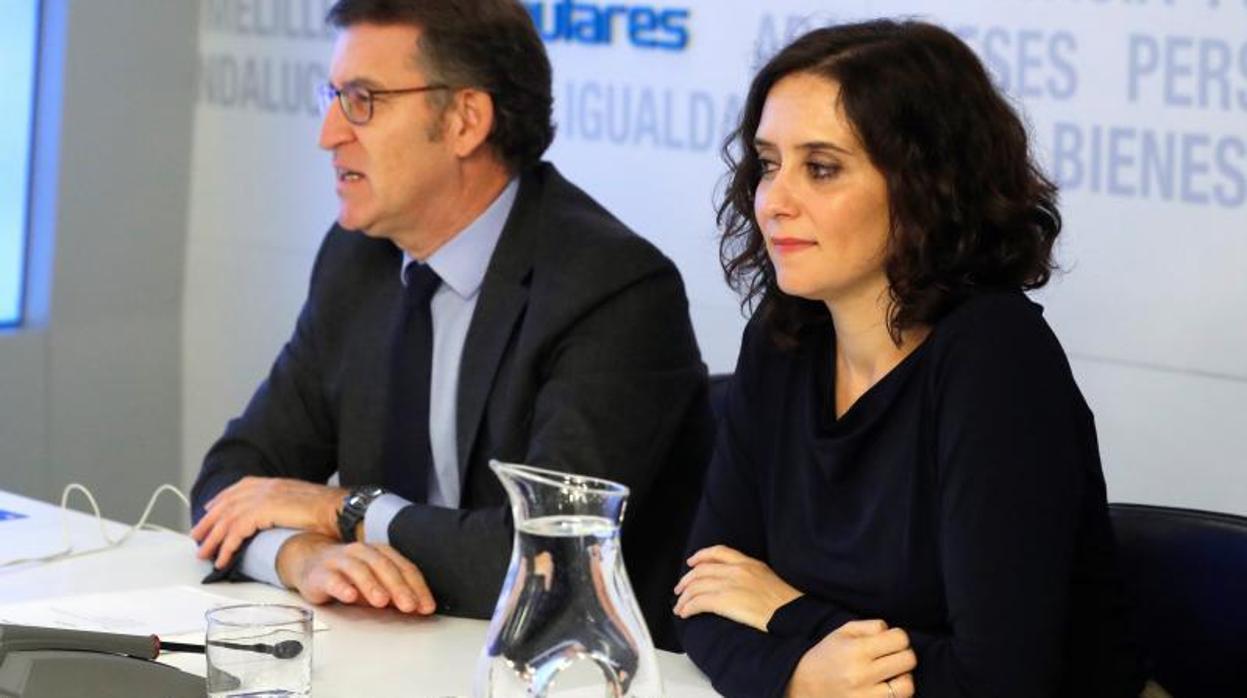 El presidente gallego, junto a la presidenta de la Comunidad de Madrid