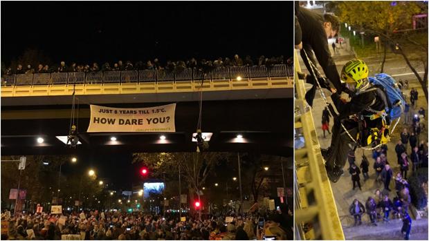 Cumbre del Clima: un activista alemán descuelga a sus hijos de 8 y 11 años de un puente de la Castellana