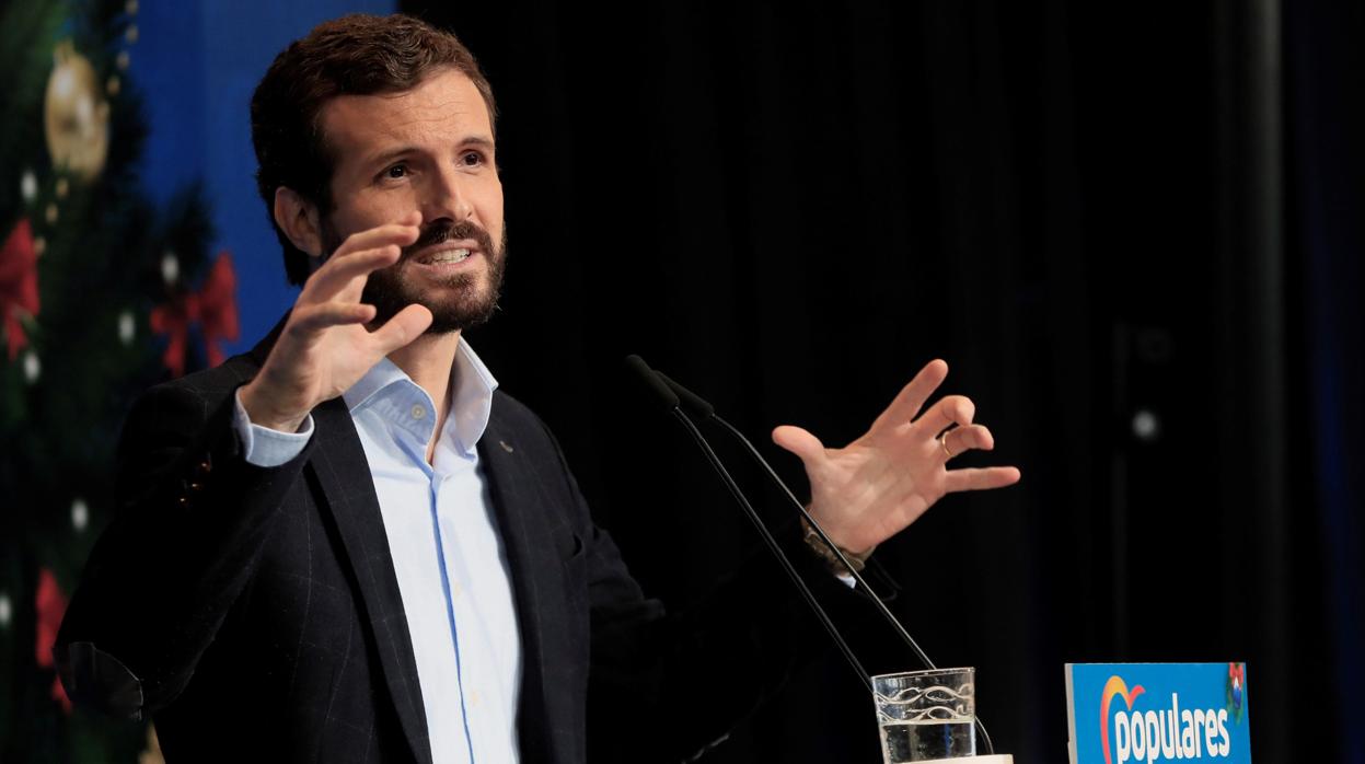 El presidente del PP, Pablo Casado, interviene durante la comida de Navidad del PP de Madrid