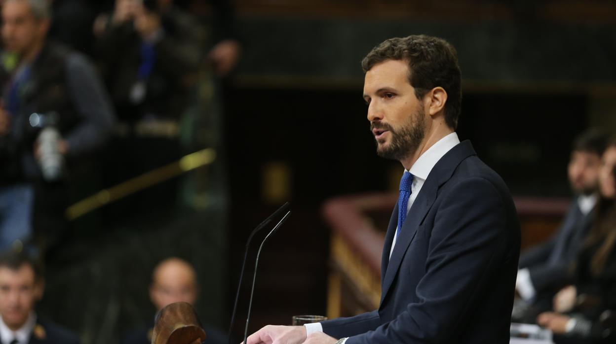 El presidente del PP, Pablo Casado, durante el debate de investidura