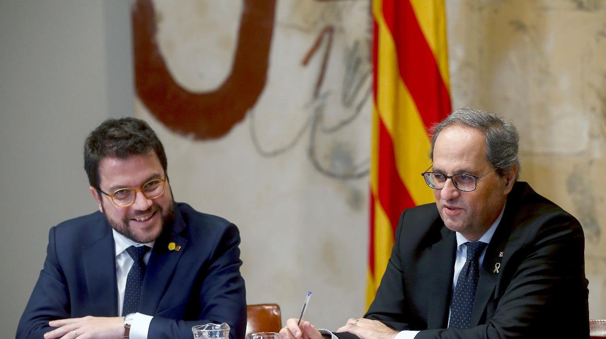 El presidente de la Generalitat, Quim Torra (JpC), junto a su vicepresidente, Pere Aragonés (ERC)