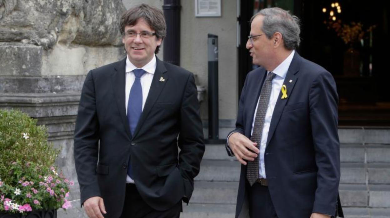 Carles Puigdemont, huido de la Justicia española en Bélgica, y Quim Torra, en una imagen de archivo