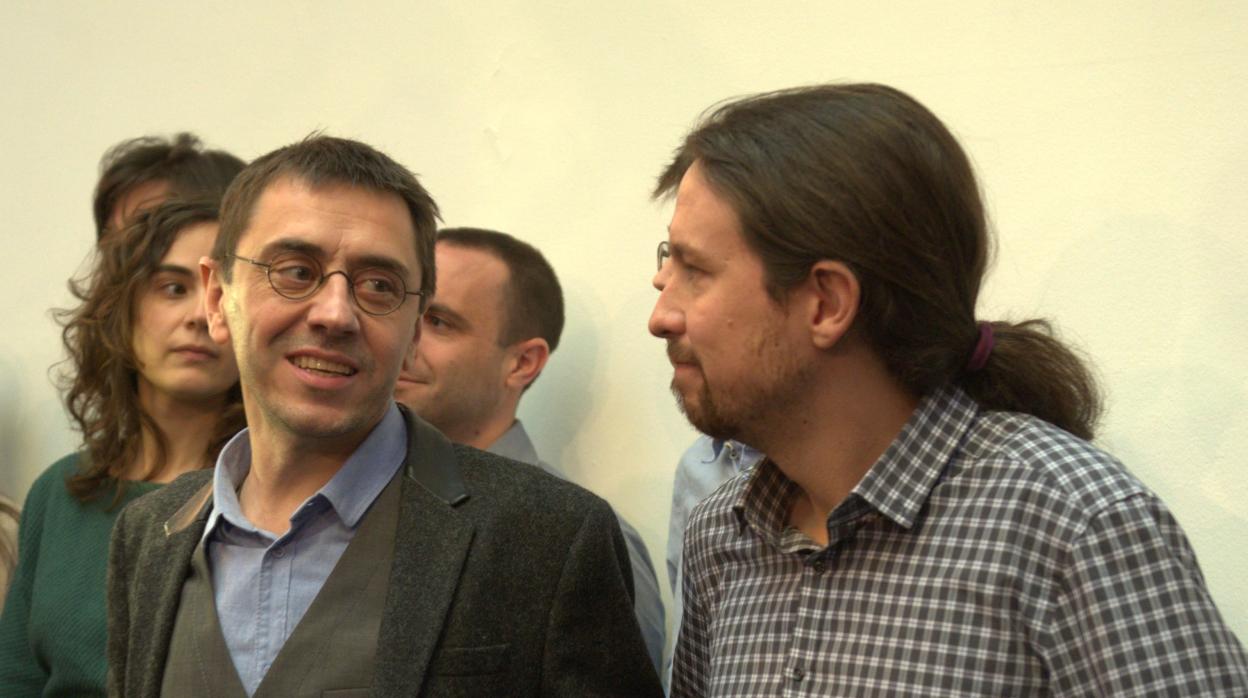 Juan Carlos Monedero y Pablo Iglesias, en un acto conjunto en 2014