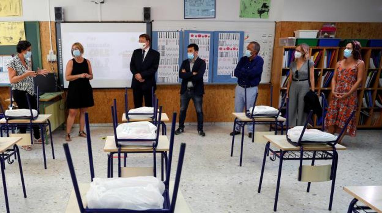 Marzà con el presidente de la Generalitat, Ximo Puig, en un colegio de Valencia en el inicio de este curso