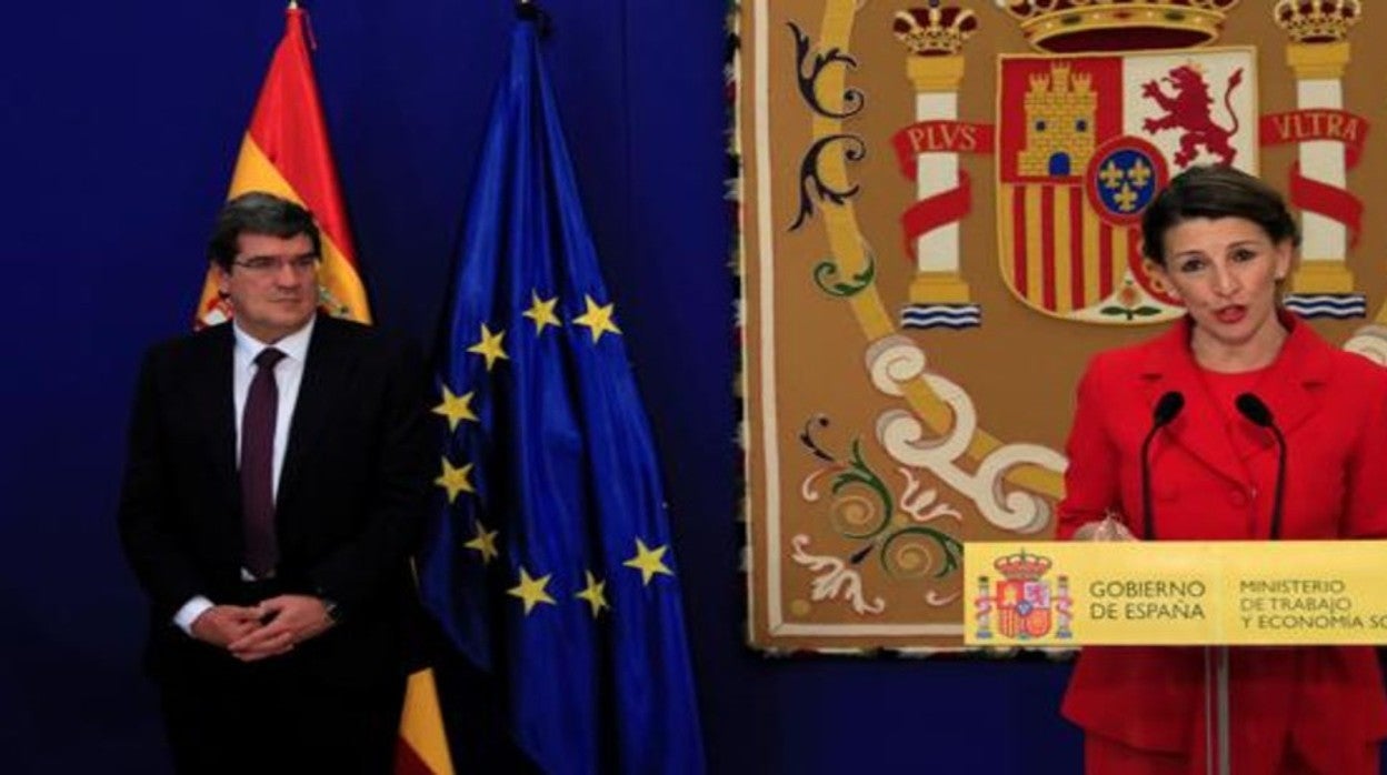 Los ministros José Luis Escrivá y Yolanda Díaz