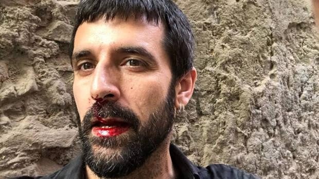 Un año de prisión para el policía que agredió al fotoperiodista Jordi Borràs