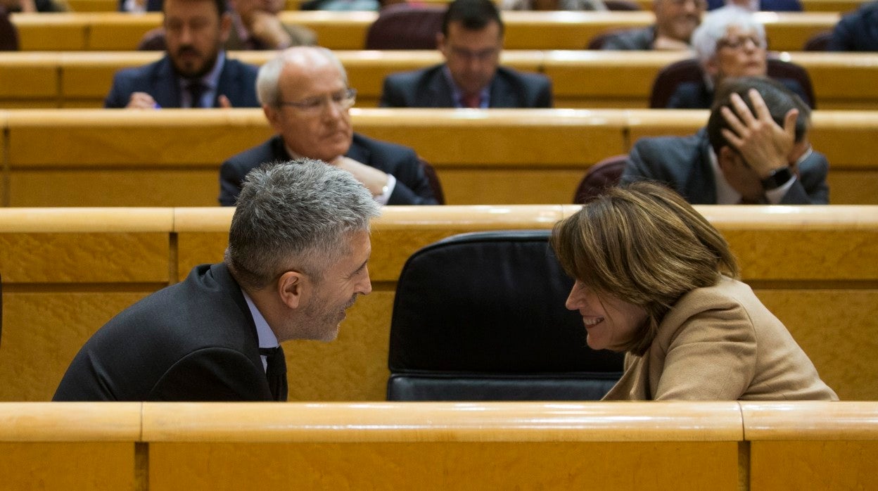 Marlaska, ministro del Interior, y Dolores Delgado, actual fiscal general del Estado, durante la reciente etapa de ésta como ministra de Justicia