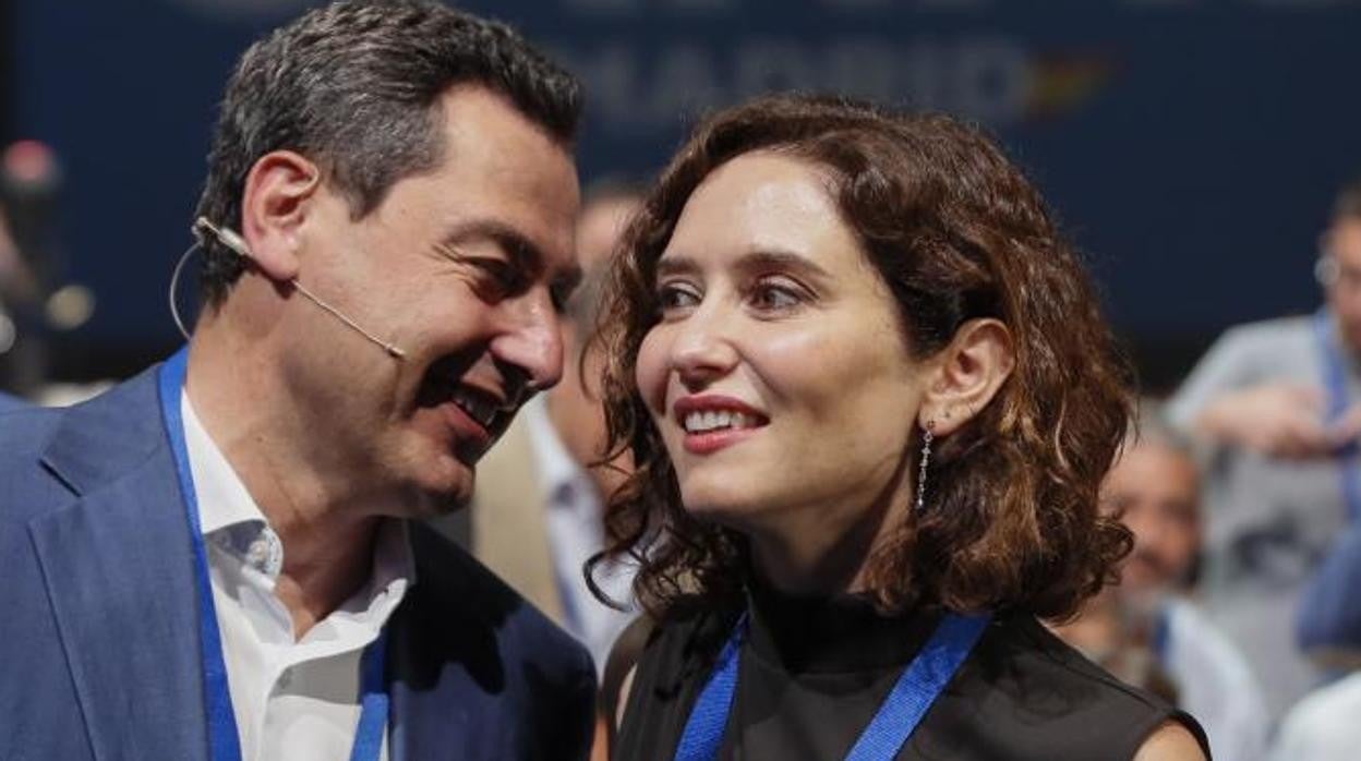 Juanma Moreno e Isabel Díaz Ayuso durante el congreso del PP de Madrid