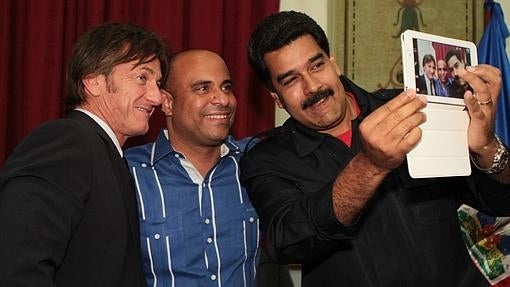 Con el primer ministro de Haití, Laurent Lamothe, y Maduro en Caracas, en 2014