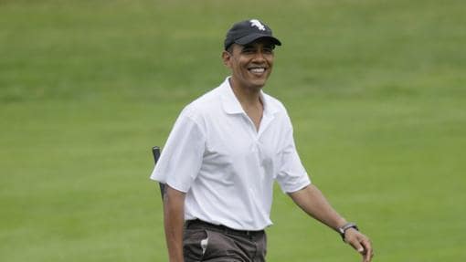 Obama jugando al golf
