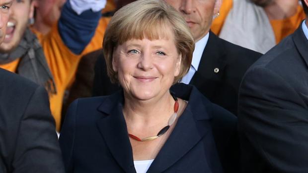 Merkel en 2013, con un collar con los colores de la bandera alemana