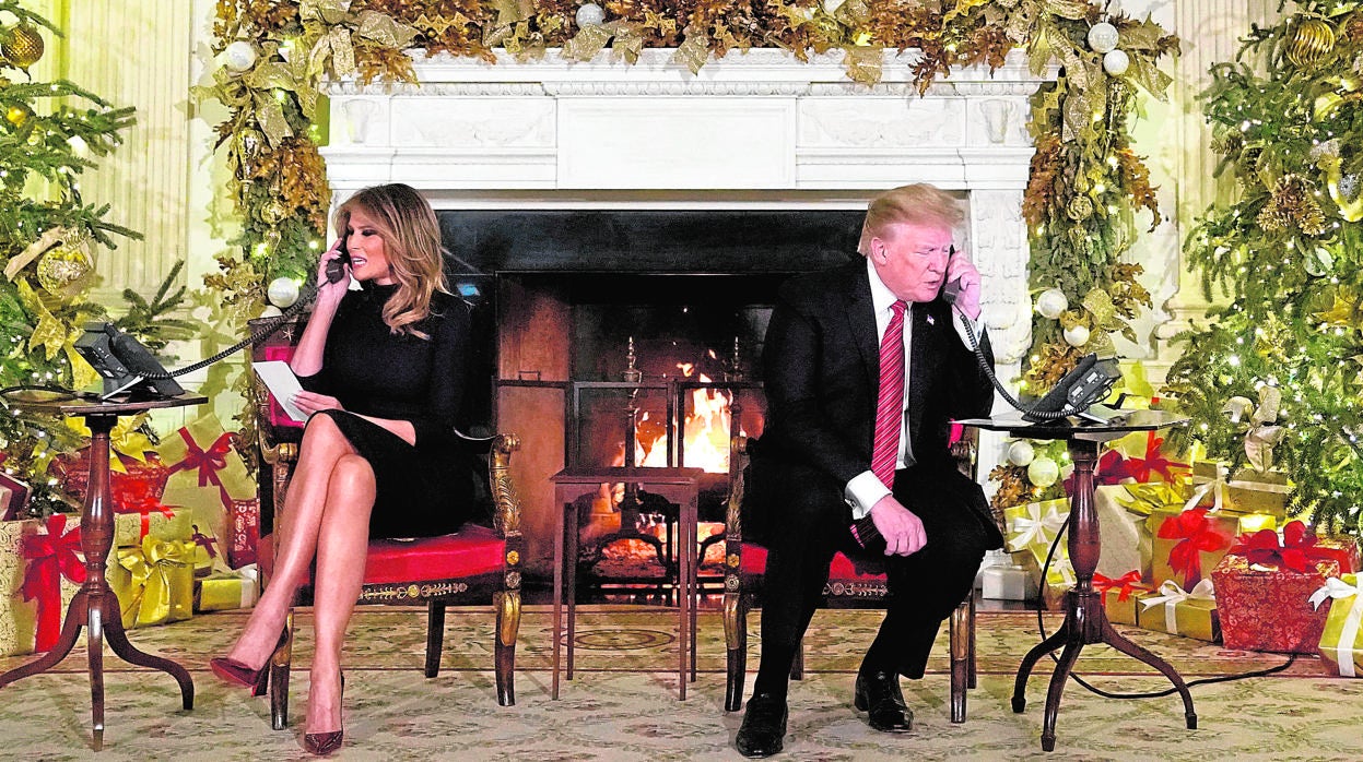 Melania y Donald Trump durante una recogida de fondos en Navidad de 2018