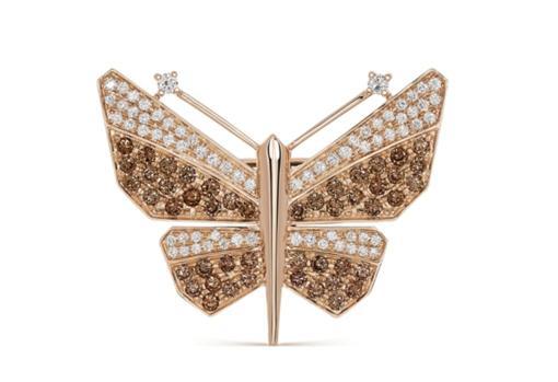 Broche de oro rosa de 18 quilates con diamantes blancos y marrones, de Suaez. Precio: 4.850€