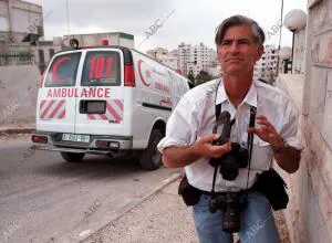 El reportero James Nachtwey cubriendo los enfrentamientos entre palestinos e...