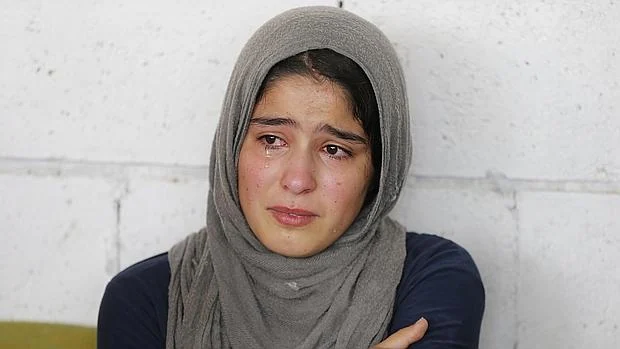 Una refugiada siria en Beirut durante una visita de la ONU a su campamento