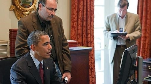 Barack Obama, con su asesor David Axelrod