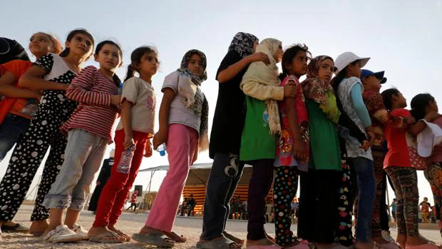 Un grupo de refugiadas sirias en un centro de acogida en Mafraq, cerca de la frontera con su país REUTERS