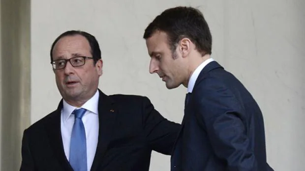 François Hollande, con Emmanuel Macron, cuando este era ministro de Economía en su gobierno