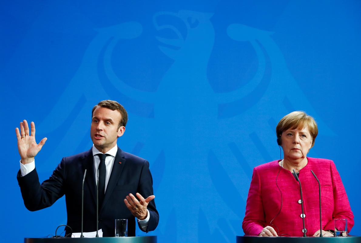 Macron y Merkel durante la rueda de prensa en Berlín