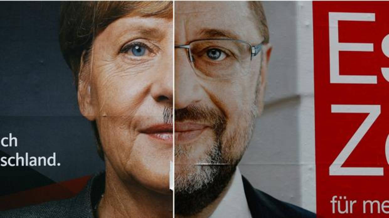 Un fotomontaje aparecido en una calle de Francfort que muestra el rostro de los dos principales candidatos