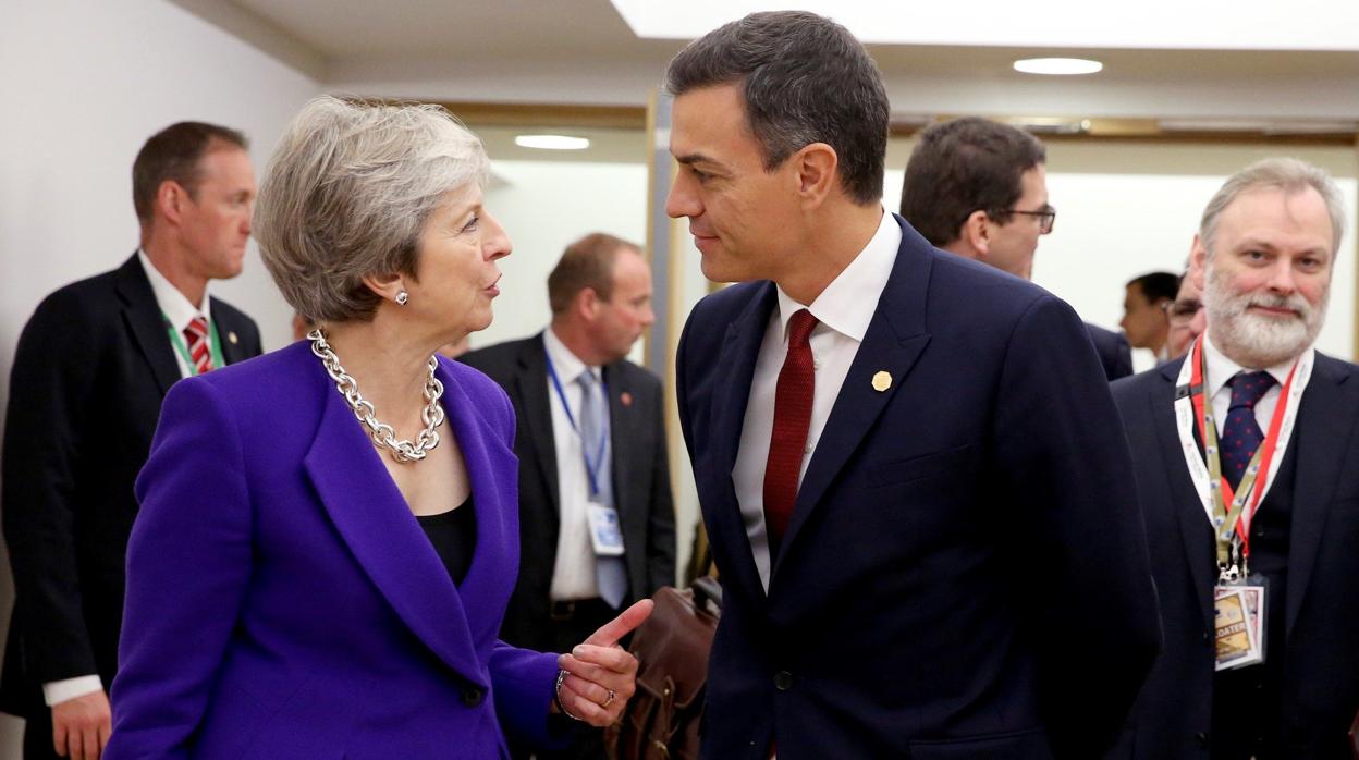 Theresa May y Pedro Sánchez