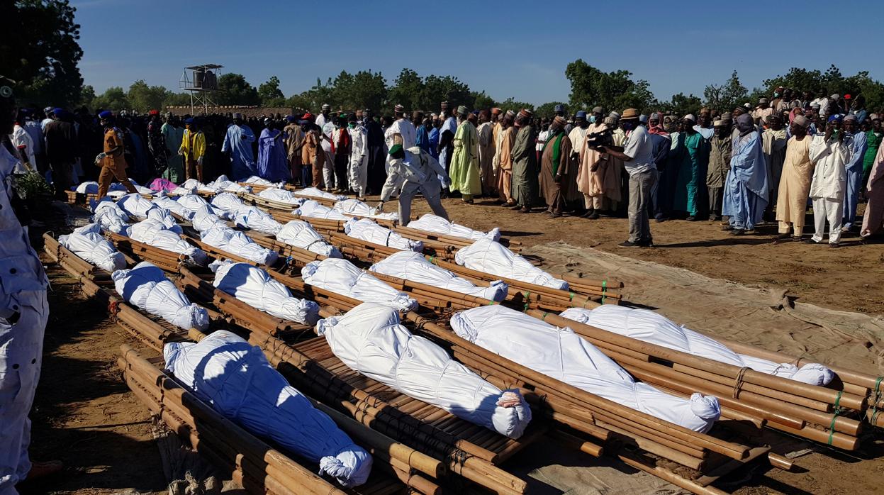 Cadáveres de algunos de los agricultores asesinados