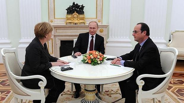 Merkel, Putin y Hollande, durante una reunión en el Kremlin