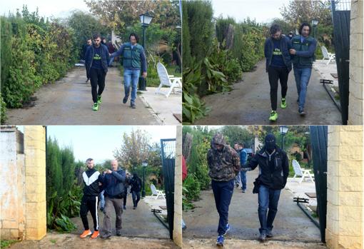 Imagen de algunos de los detenidos saliendo del chalet donde guardaban los efectos robados.