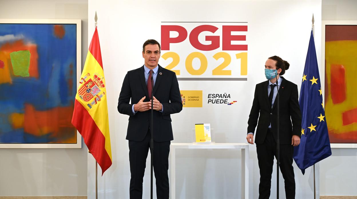 Sánchez y Iglesias durante la presentación del borrador de presupuestos